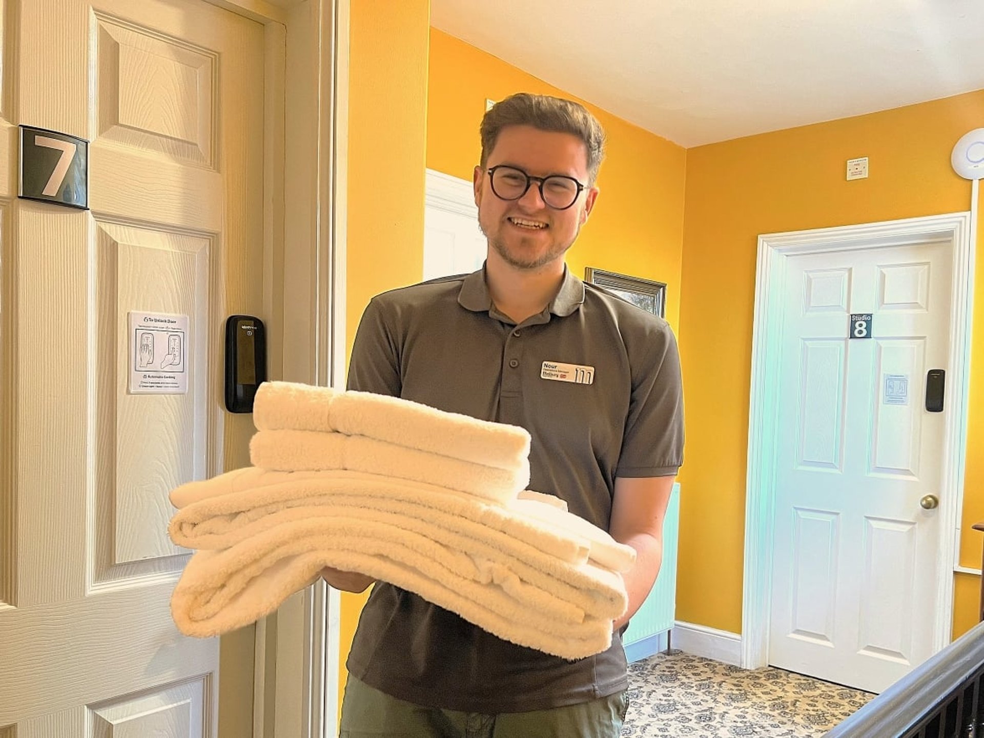 Housekeeper with towels