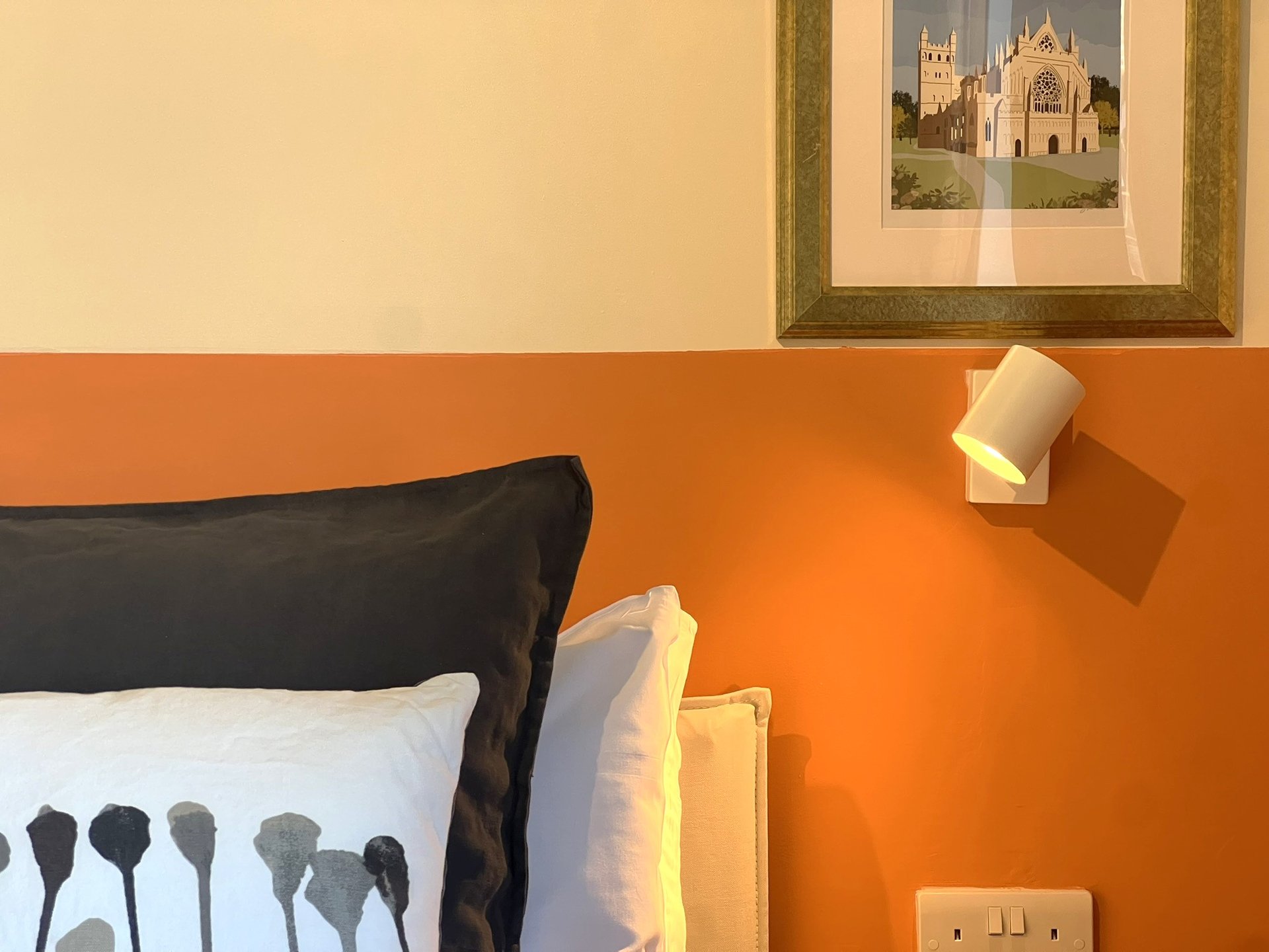 Wall light next to bed